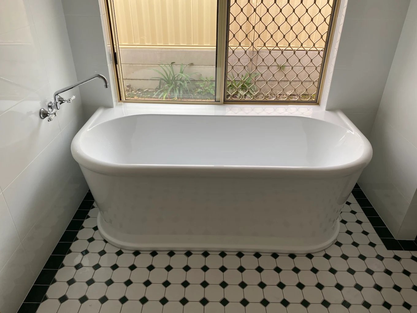 Back-to-wall bath and wall taps installed, Brent Smith Plumbing and Gas